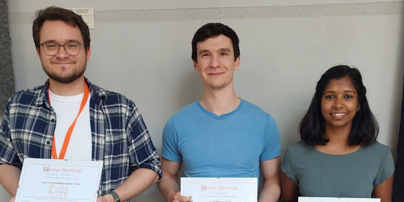 Picture of Alexandre Walther, Lars Hebenbrock and Malavika Karikkal with their prices from the Girona Seminar 2024.